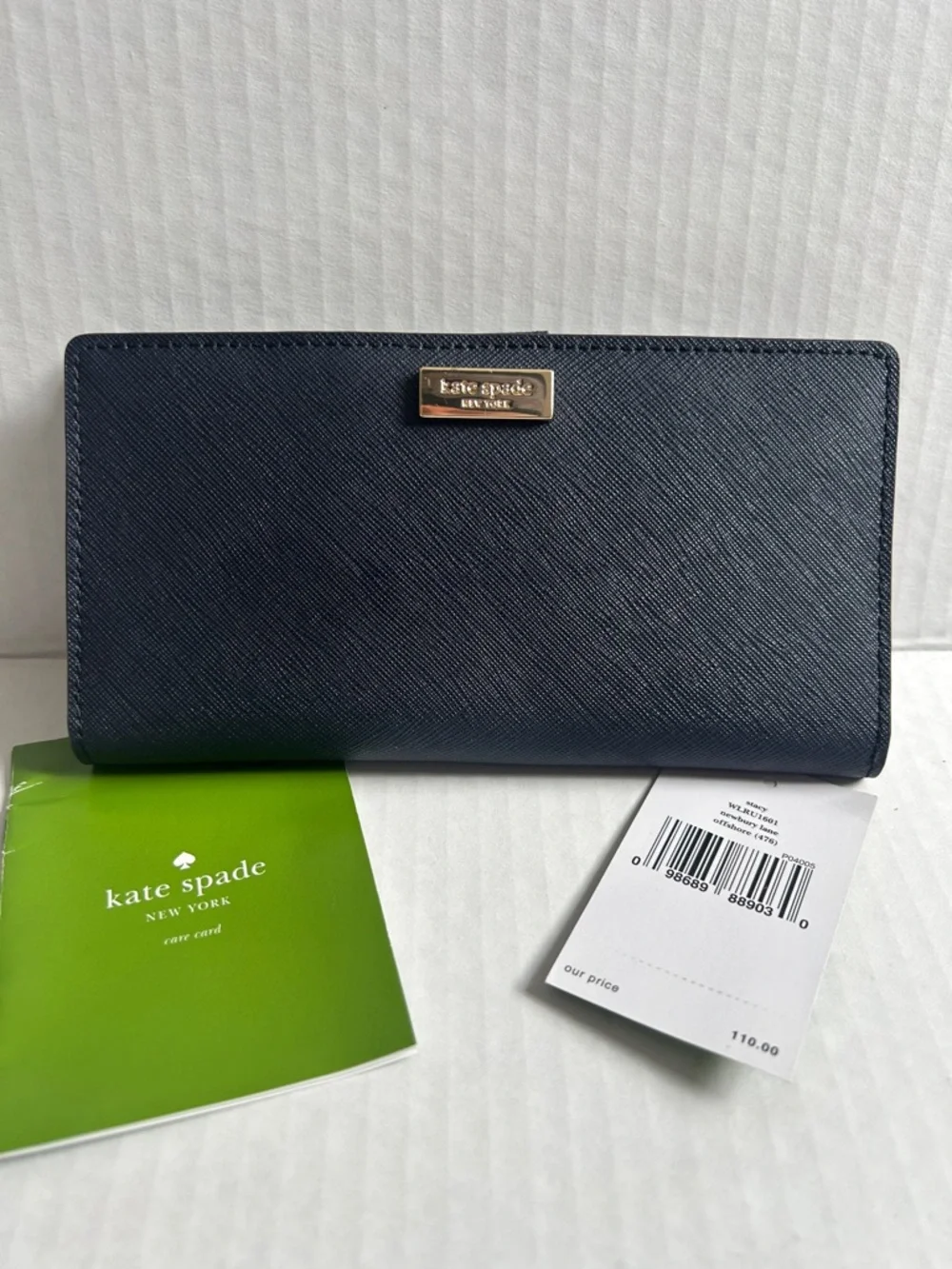 Kate Spade Newbury Lane Stacy Bifold Wallet In Navy Leather